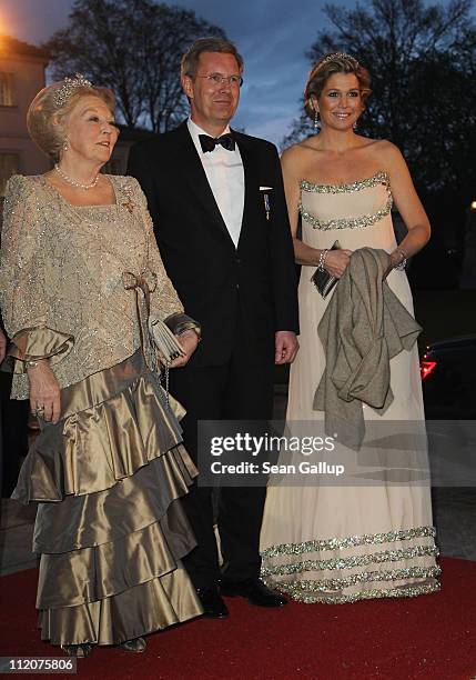 Queen Beatrix of the Netherlands, German President Christian Wulff and Princess Maxima of the Netherlands attend a state banquet given in honour of...