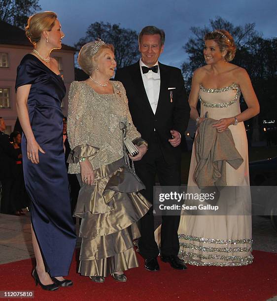 German First Lady Bettina Wulff, Queen Beatrix of the Netherlands, German President Christian Wulff and Princess Maxima of the Netherlands attend a...