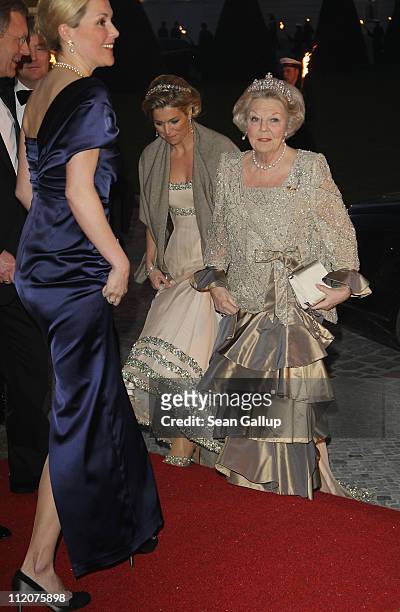 German First Lady Bettina Wulff, Princess Maxima of the Netherlands and Queen Beatrix of the Netherlands attend a state banquet given in honour of...