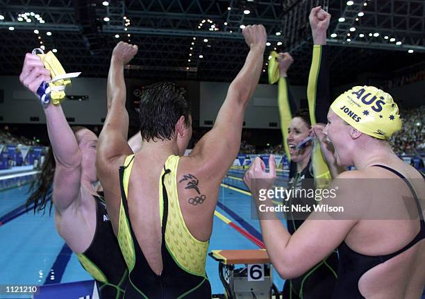 Sarah Ryan, Leisel Jones, Dyana Calub and Petria Thomas of Australia after winning Gold in the Womens 4x100m Medley Relay at the Marine Messe Pool...
