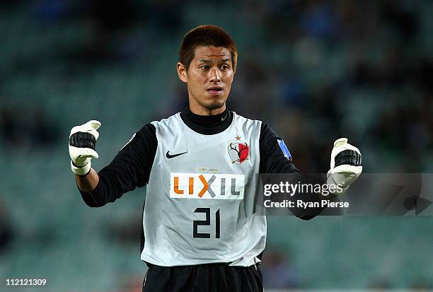 Hitoshi Sogahata of Kashima celebrates after Kashima scored their first goal during the group H AFC Champions League match between Sydney FC and the...