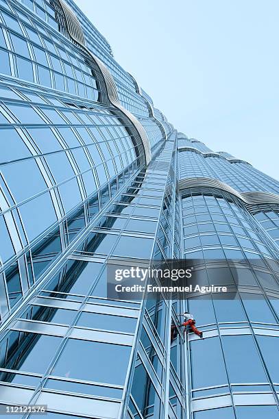 Alain Robert, the "French Spiderman", climbs the highest tower in the world, Burj Khalifa on March 28, 2011 in Dubai. It took him six hours to ascend...