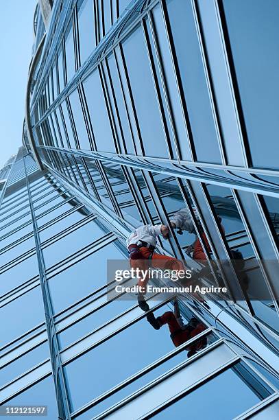 Alain Robert, the "French Spiderman", climbs the highest tower in the world, Burj Khalifa on March 28, 2011 in Dubai. It took him six hours to ascend...