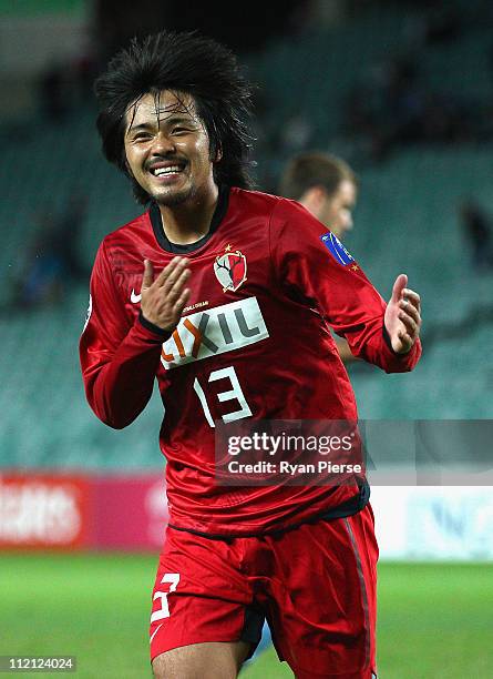 Shinzo Koroki of Kashima celebrates after scoring his teams third goal during the group H AFC Champions League match between Sydney FC and the...