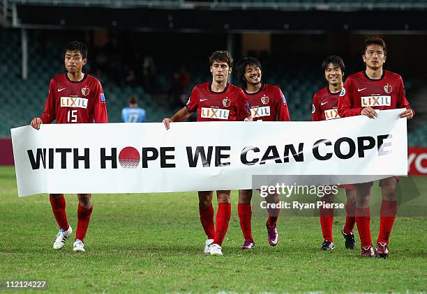 Kashima players thank their fans after the group H AFC Champions League match between Sydney FC and the Kashima Antlers at Sydney Football Stadium on...