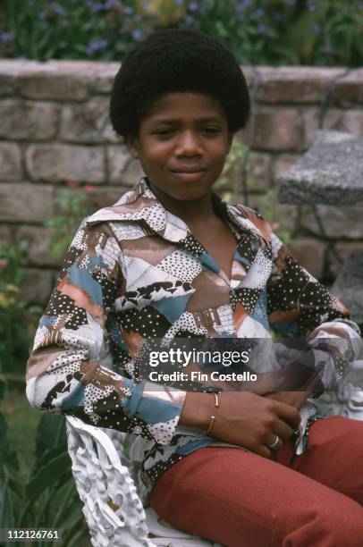 Randy Jackson, of the Jackson 5, sitting in a chair posing for a portrait in Jamaica, circa 1975.