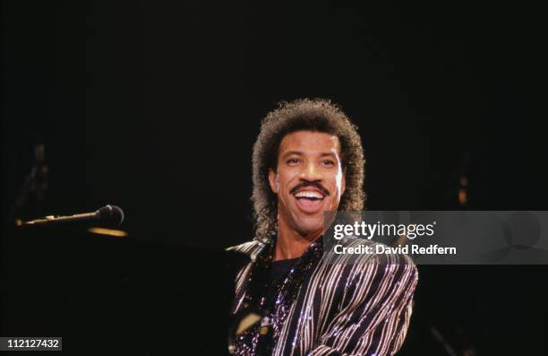 Lionel Richie, U.S. Singer-songwriter, during a live concert performance at Wembley Arena, London, England, Great Britain, May 1987.