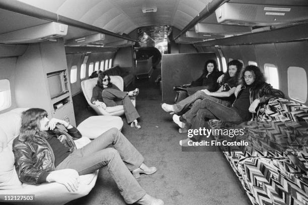 Deep Purple , English rock band, relaxing in the band's Starship Jet plane, 28 February 1974.
