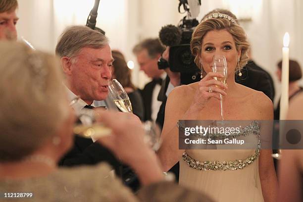 Former German President Horst Koehler and Princess Maxima of the Netherlands attend a state banquet given in honour of the visiting Dutch royals at...