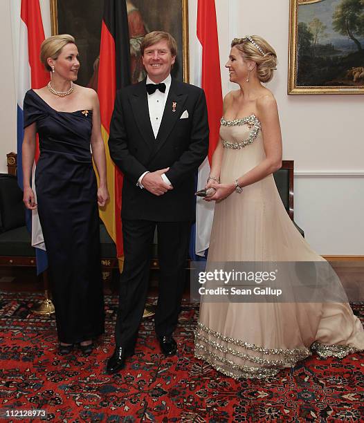 Prince Willem-Alexander of the Netherlands, Princess Maxima of the Netherlands and German First Lady Bettina Wulff attend a state banquet given in...