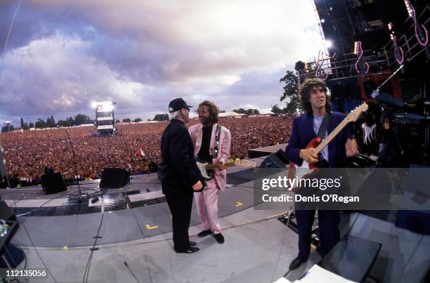 Eric Clapton and Elton John live at Knebworth, with Phil Palmer, 1990.
