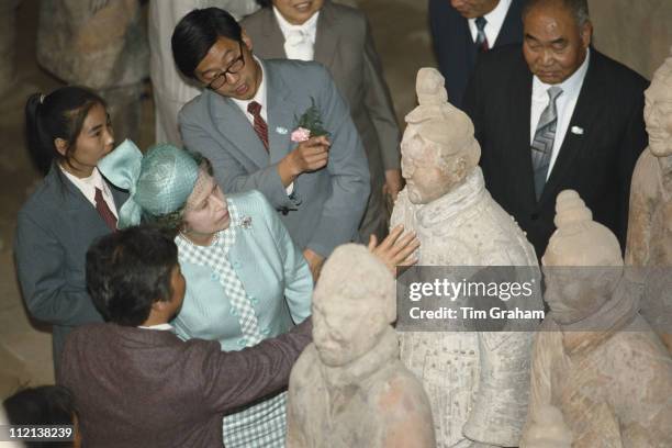 Queen Elizabeth II inspecting the Terracotta Army, in Lintong District, Xi'an, Shaanxi province, near the Mausoleum of the First Qin Emperor, during...