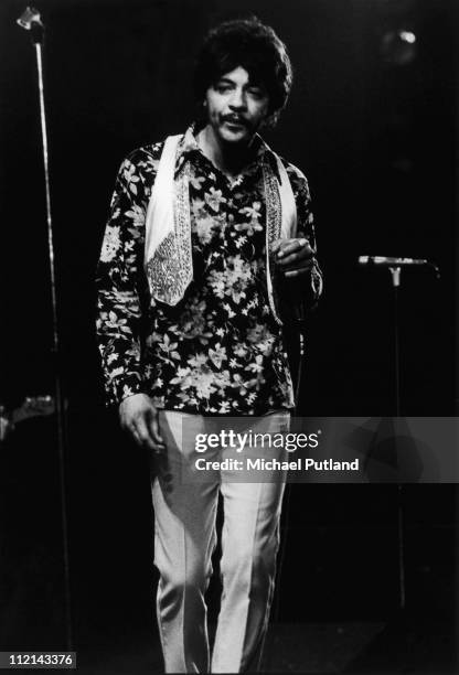 Arthur Lee of Love performs on stage, London, 1974.