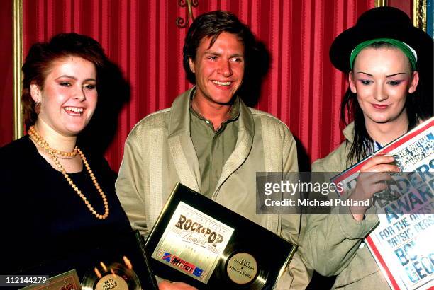 Alison Moyet, Simon LeBon of Duran Duran and Boy George of Culture Club pose at the Daily Mirror Rock & Pop Awards, February 1982.