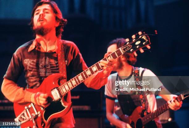 Micky Jones and Alan 'Tweke' Lewis of Man perform on stage at Alexandra Palace Festival, London, 28th July 1973.