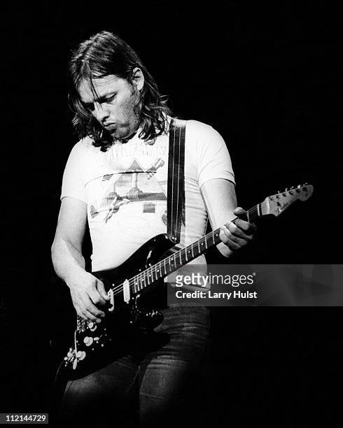 David Gilmour with Pink Floyd performs Oakland Coliseum in Oakland, California on May 9, 1977.
