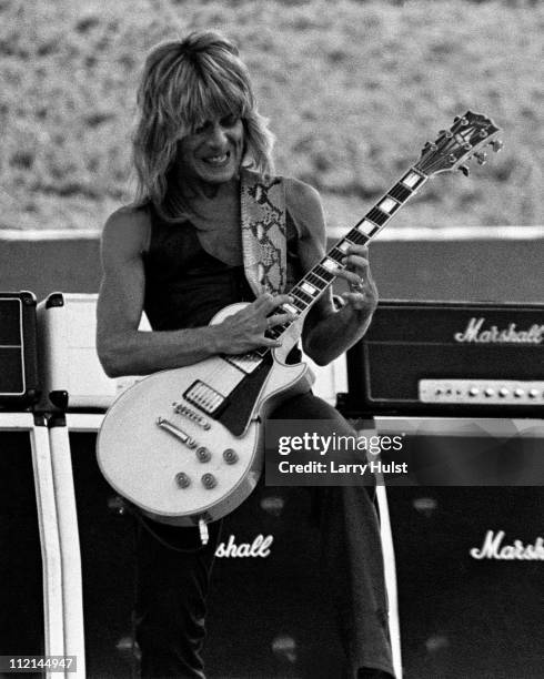 Randy Rhoads with Ozzy Osbourne performing at the Oakland Coliseum in Oakland, California on July 4, 1981.