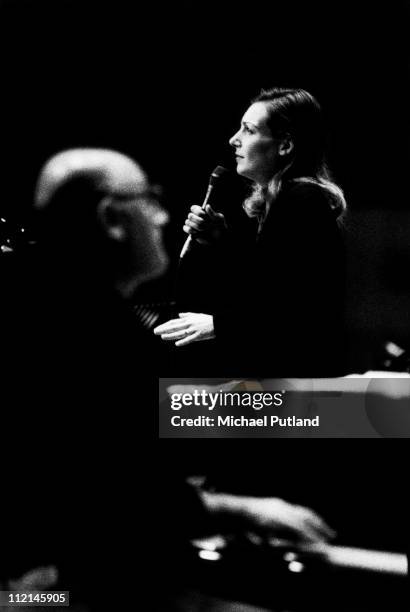 Ute Lemper and Michael Nyman perform on stage at the Royal Festival Hall, London, 1992.