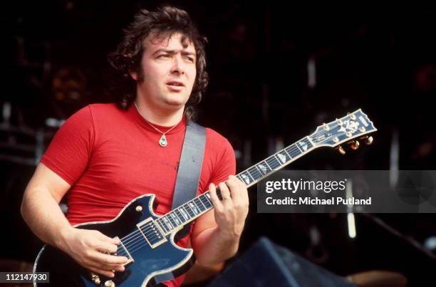 Bernie Marsden of Whitesnake performs on stage, Monsters Of Rock, Donnington Park, 22nd August 1981. He plays a Yamaha SG2000 guitar.