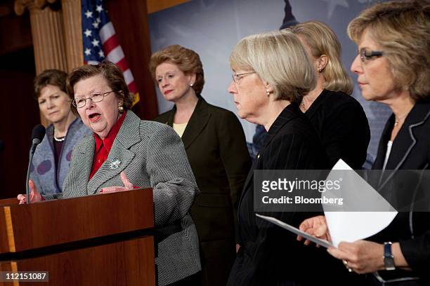 Senator Jeanne Shaheen, a Democrat from New Hampshire, left to right, Senator Barbara Mikulski, a Democrat from Maryland, Senator Debbie Stabenow, a...