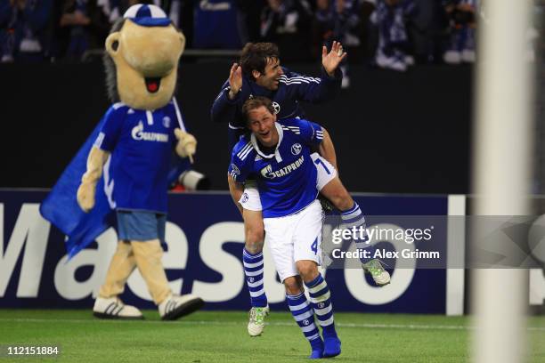 Benedikt Hoewedes and Raul Gonzalez of Schalke celebrate after the UEFA Champions League Quarter Final second leg match between Schalke 04 and Inter...