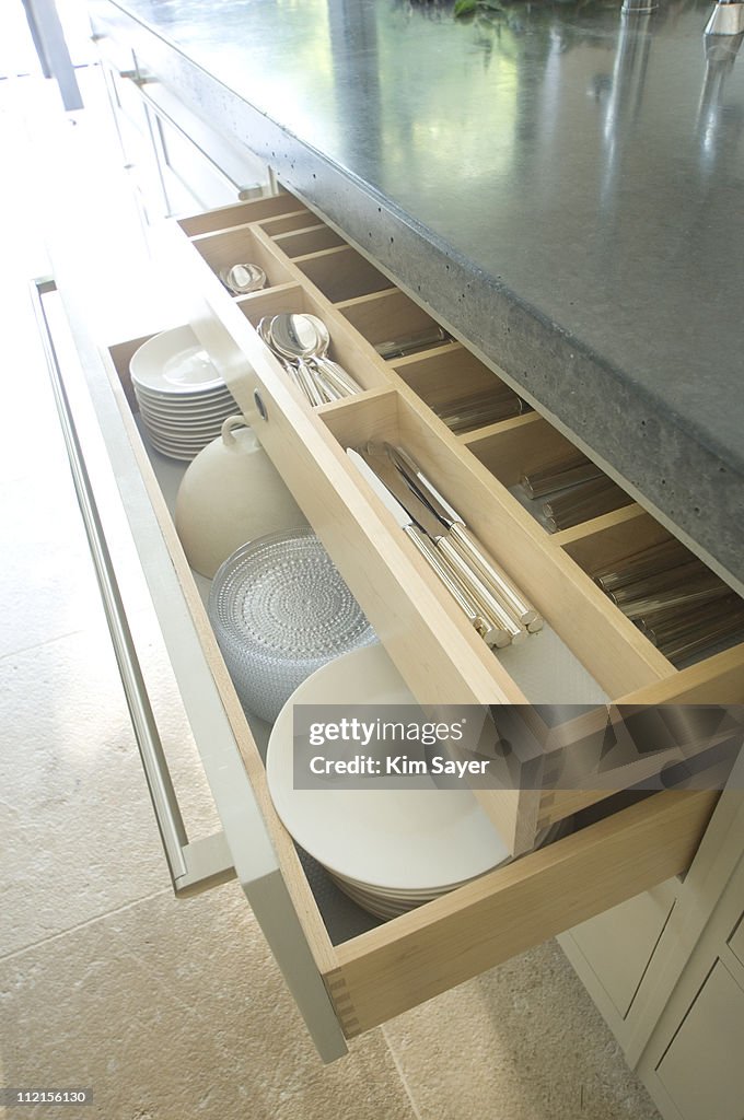 Open drawers in modern kitchen