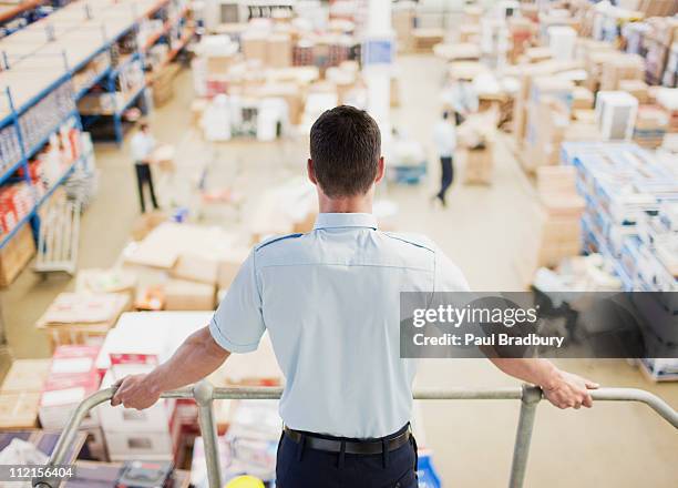 supervisor  monitoring shipping work - post structure stock pictures, royalty-free photos & images