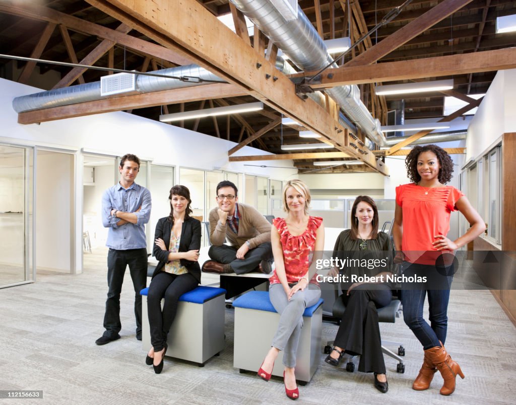 Business people sitting together in office