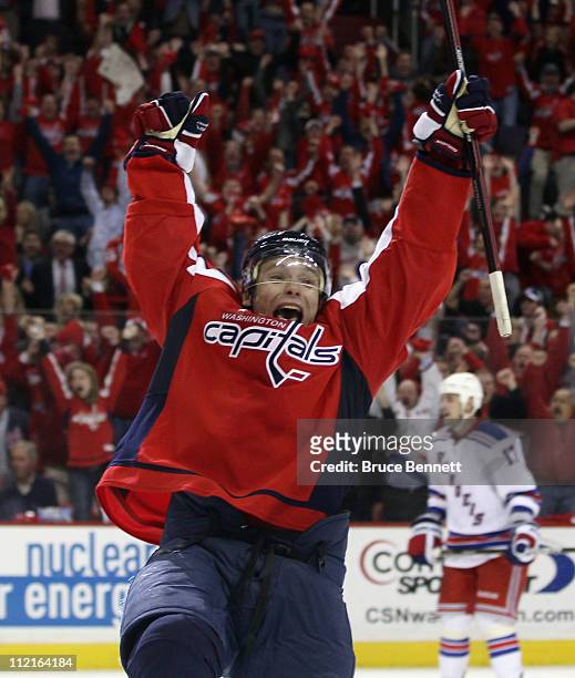 Alexander Semin of the Washington Capitals scores the game winning goal at 18:24 of overtime against the New York Rangers in Game One of the Eastern...