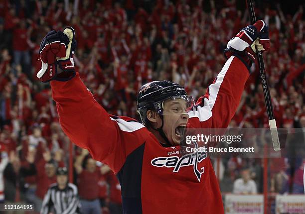 Alexander Semin of the Washington Capitals scores the game winning goal at 18:24 of overtime against the New York Rangers in Game One of the Eastern...