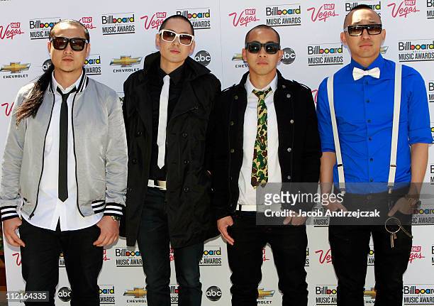 Splif, Kev Nish, DJ Virman and Prohgress of Far East Movement pose at the 2011 Billboard Music Awards finalists announcement at Chateau nightclub at...