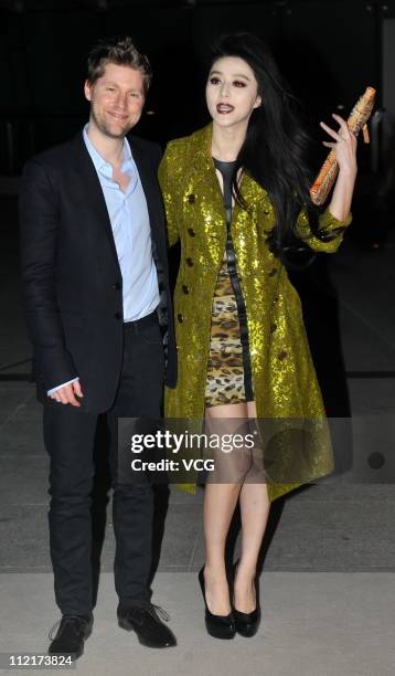 Fan Bingbing and fashion apparel company Burberry's chief creative director Christopher Baily attend the corporate event of the fashion apparel...