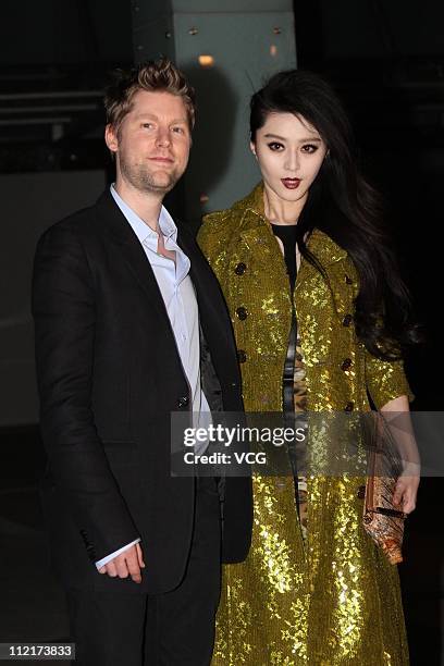 Fan Bingbing and fashion apparel company Burberry's chief creative director Christopher Baily attend the corporate event of the fashion apparel...