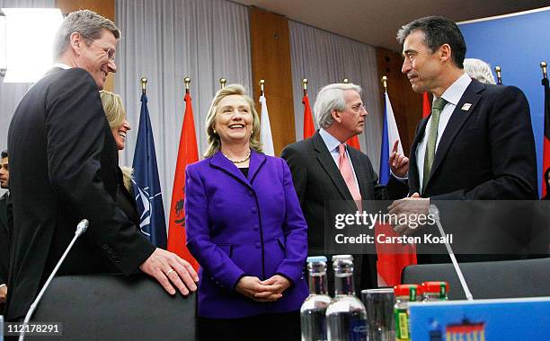 Secretary General Anders Fogh Rasmussen , U.S. Secretary of State Hillary Clinton and German Foreign Minister Guido Westerwelle arrive at an informal...