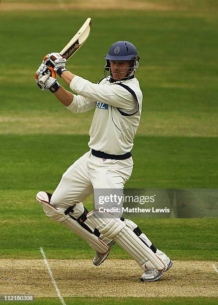 Jimmy Adams of Hampshire hits the ball towards the boundary during the LV County Championship Division One match between Nottinghamshire and...