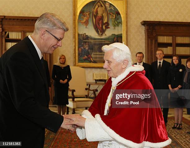 President of Latvia Valdis Zatlers is greeted by Pope Benedict XVI at his private library on April 14, 2011 in Vatican City, Vatican.