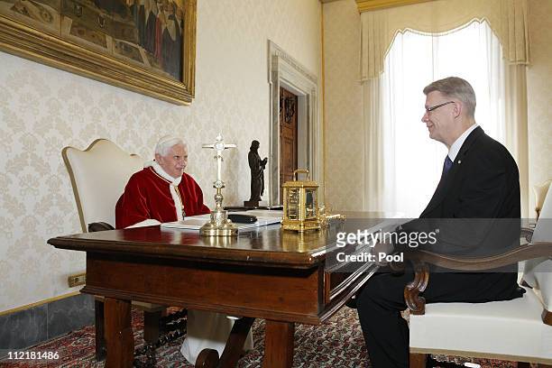 Pope Benedict XVI meets with visiting President of Latvia Valdis Zatlers at his private library on April 14, 2011 in Vatican City, Vatican.