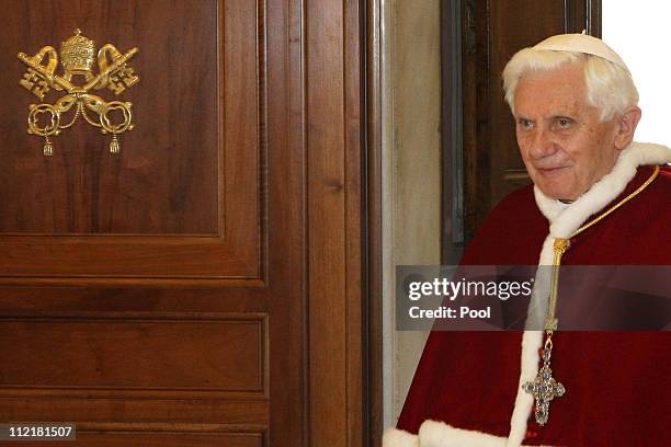 Pope Benedict XVI waits for visiting President of Latvia Valdis Zatlers to arrive for a private audience at his private library on April 14, 2011 in...