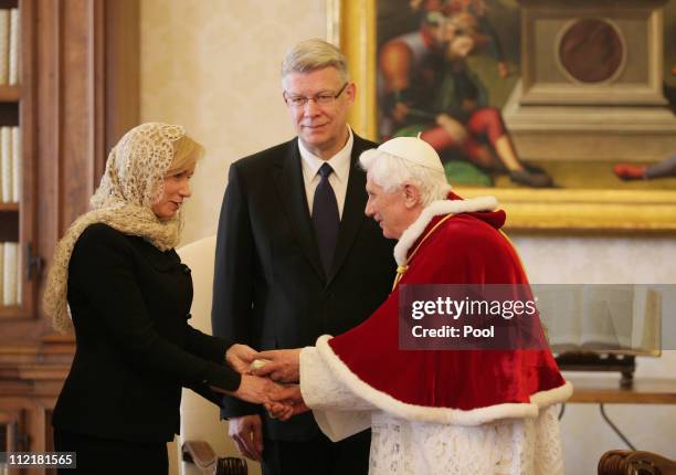 President of Latvia Valdis Zatlers and his wife Lilita Zatlere meet with Pope Benedict XVI at his private library on April 14, 2011 in Vatican City,...