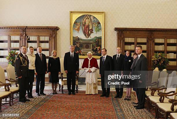President of Latvia Valdis Zatlers, his wife Lilita Zatlere and his delegation meet with Pope Benedict XVI at his private library on April 14, 2011...