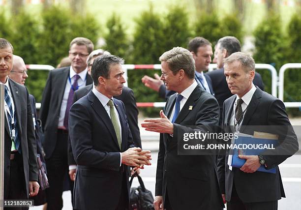 Secretary General Anders Fogh Rasmussen is greeted by German Foreign Minister Guido Westerwelle at the beginning of an informal NATO Foreign...