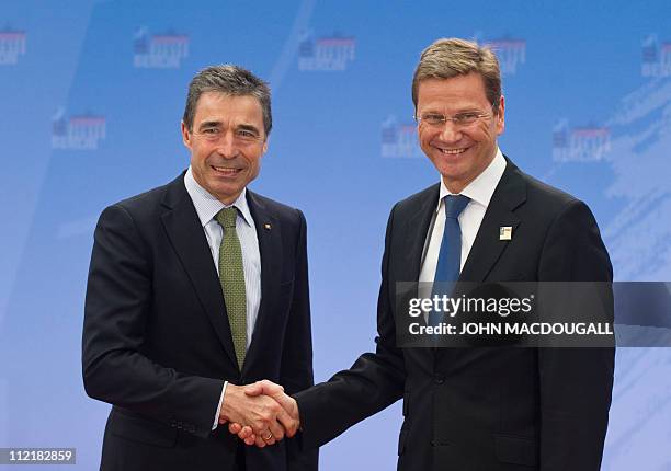 Secretary General Anders Fogh Rasmussen is greeted by German Foreign Minister Guido Westerwelle at the beginning of an informal NATO Foreign...