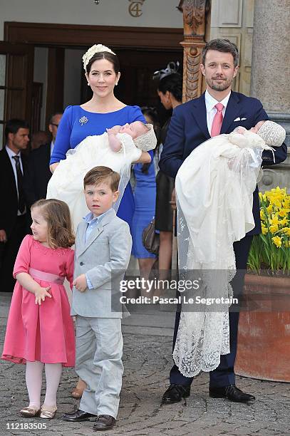 Crown Princess Mary and Crown Prince Frederik of Denmark with Princess Isabella and Prince Christian pose after the christening of their twins Prince...