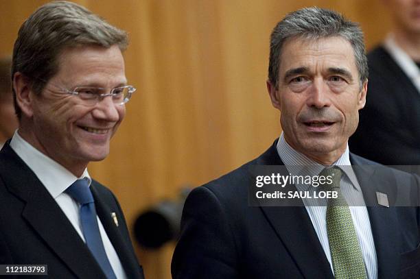 General Secretary Anders Fogh Rasmussen arrives alongside German Foreign Minister Guido Westerwelle to a NATO Foreign Minister meeting on Afghanistan...