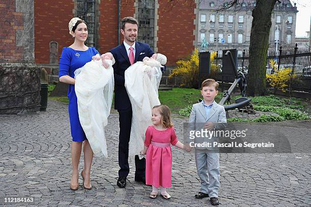 Crown Princess Mary and Crown Prince Frederik of Denmark with Princess Isabella and Prince Christian pose after the christening of their twins Prince...