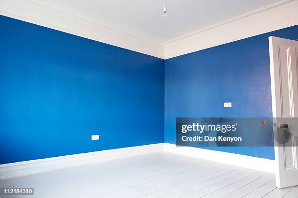 empty blue painted room - fresh deals ストックフォトと画像