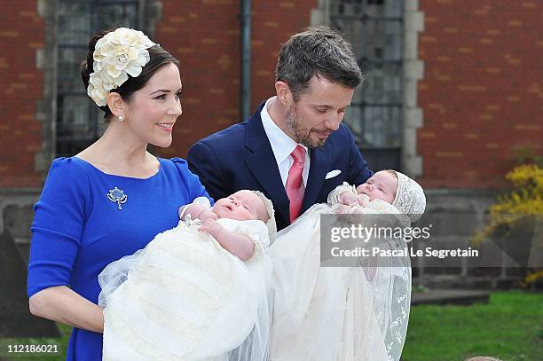 Crown Princess Mary and Crown Prince Frederik of Denmark pose after the christening of their twins Prince Vincent and Princess Josephine at Holmens...