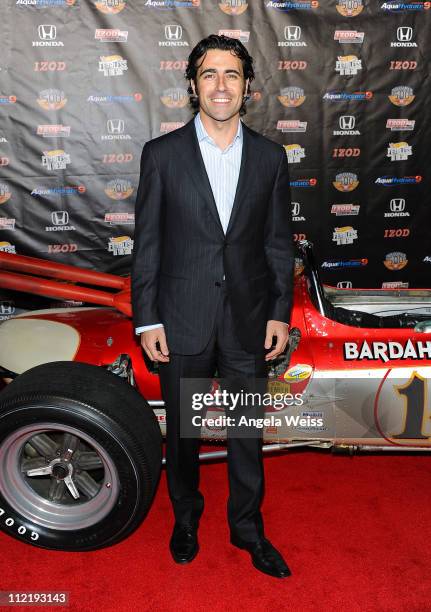 IndyCar Series Driver Dario Franchitti arrives at the IZOD IndyCar Series party to celebrate the 100th anniversary of the Indianapolis 500 at The...