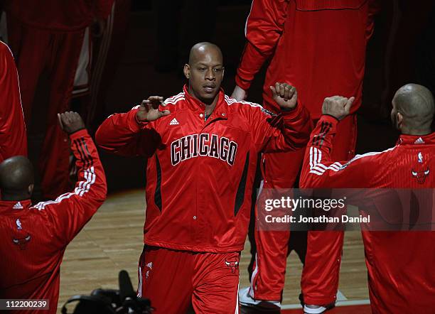 Keith Bogans of the Chicago Bulls is greeted by teammates during player introductions before a game against the New Jersey Nets at the United Center...