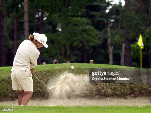 Mi Hyun Kim of Korea plays her third shot on the 476 yard par five 1st hole during the Third Round of the Weetabix Women's Open on the Old Course at...